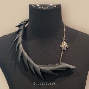 Available for purchase with @7lions !! NWOT Black rubber spine necklace.